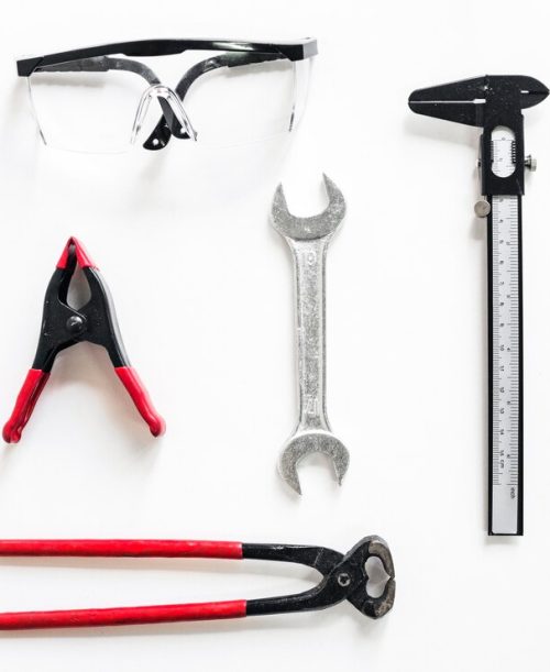 safety-glasses-near-construction-tools_23-2147831893